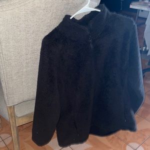 I’m selling a black fluffy sweater